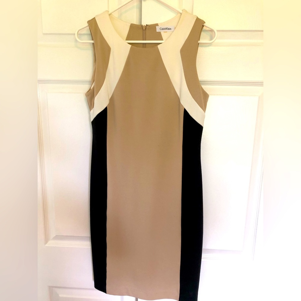 Calvin Klein shift style knit dress. Hits above knee.
